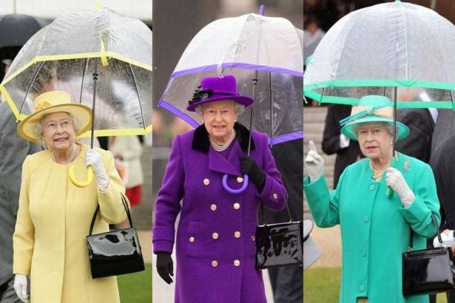 衣装と傘が一体となったトータルコーディネートがおしゃれなエリザベス女王