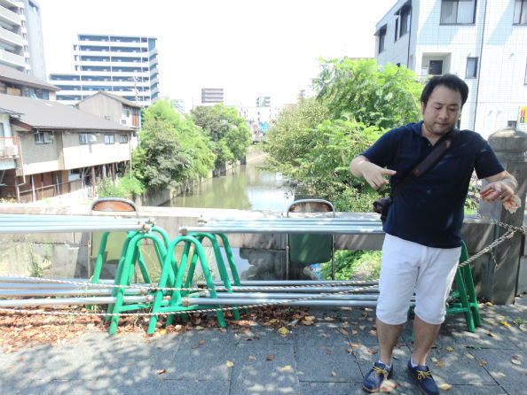古町地区を流れる坪井川。右端は吉野新町・古町復興プロジェクト事務局長